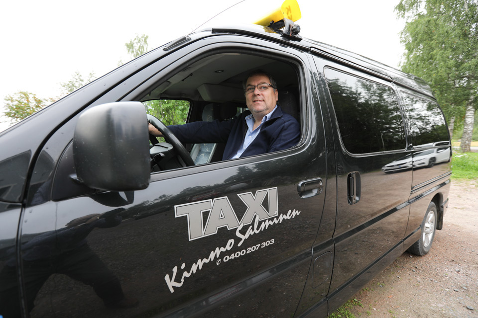 Taxi med kunden i centrum